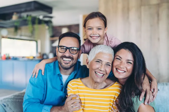 Smiling Ontario family enjoying time together – representing security through critical illness insurance